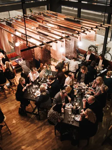 Restaurant environment with dinner guests